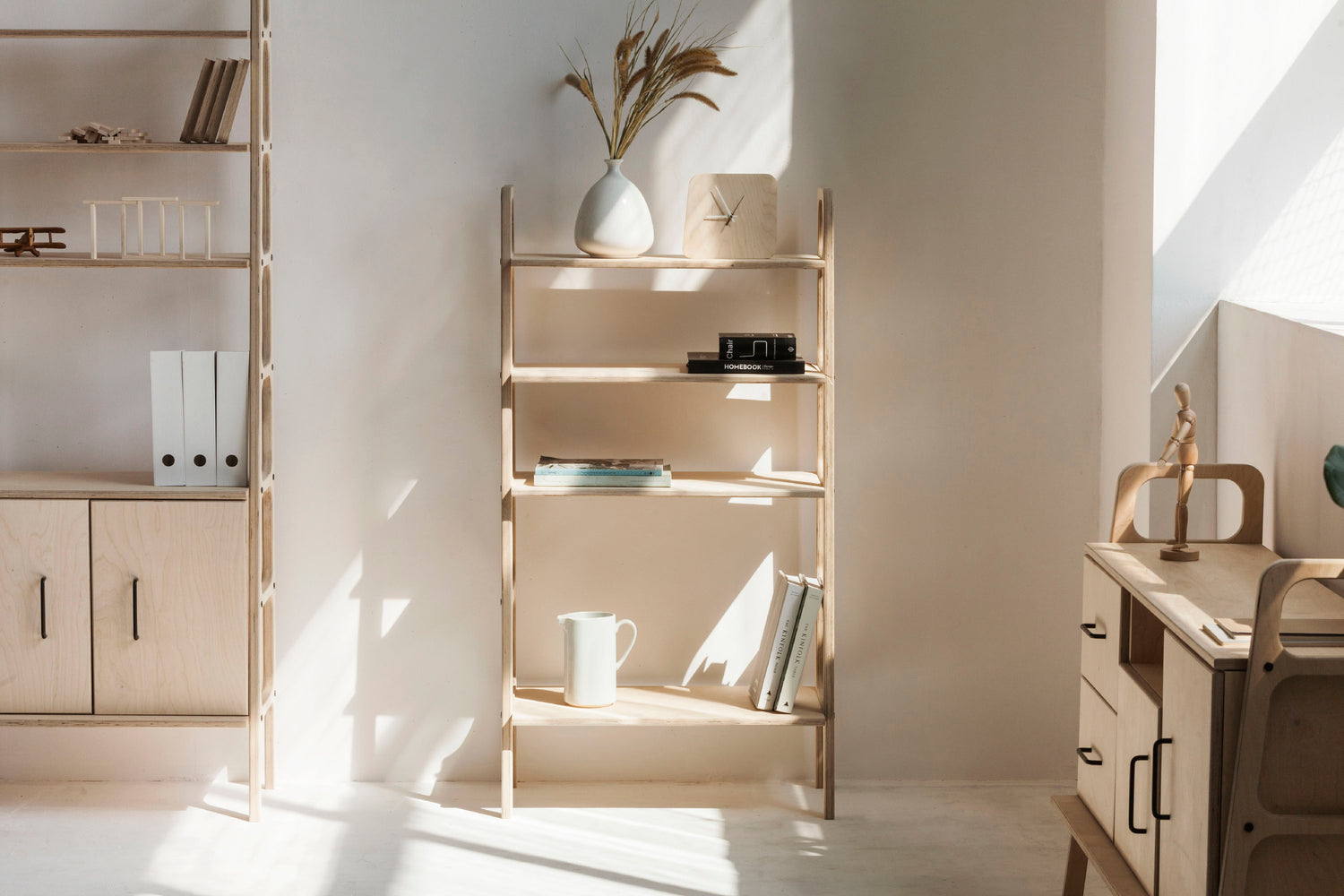 Plywood bookcases and living room shelves in the Scandinavian style