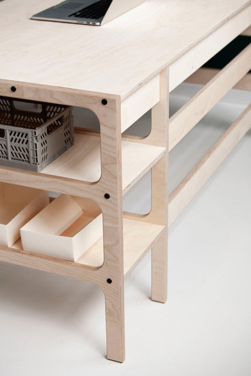 Back-of-Mid-century-modern-corner-desk-with-drawers-and-shelves-in-natural-wood-stain